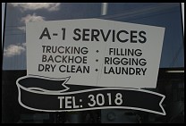 Digital photo titled backhoe-and-laundry