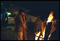 Staying warm around the fire, outside the Fulton Fish Market.  Manhattan 1994 (pre burning).