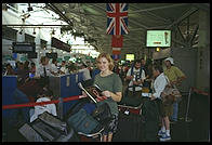 Eve standing in British Airways in Boston airport, heading for Stockholm