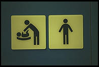 Stockholm airport, man changing diapers sign