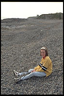 Girl on a rocky beach north of Dublin, Ireland.