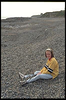 Girl on a rocky beach north of Dublin, Ireland.