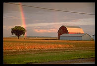 Rainbow and barn.  Ontario, Canada.
