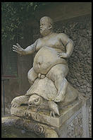 It may look like a fat guy riding a turtle, but it is actually art:  Valerio Cioli's 1560 statue in Florence's Boboli Gardens.  It shows Pietro Barbino, Cosimo I's court dwarf, as Bacchus.