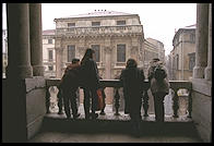 Kids look at at Vicenza's Piazza dei Signori, from the loggia designed by Palladio