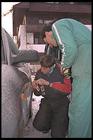 Attempting to open my Avis rental car's frozen lock, in Cortina