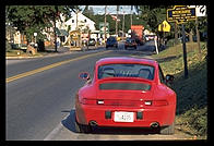 Porsche and sign for Intercourse, Pennsylvania.