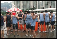 Hosing off after dragon boat racing.  Sha Tin, Hong Kong