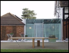 Digital photo titled orange-house-picnic-table