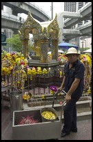 Digital photo titled erawan-temple-with-skytrain-in-background