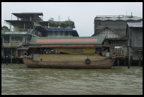 Digital photo titled river-bank-boat