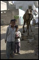 Digital photo titled kids-and-camel-behind-jain-temple-in-sanganer