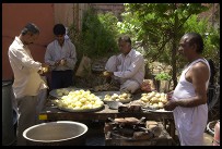 Digital photo titled peeling-potatoes-downtown-jaipur