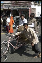 Digital photo titled rickshaw-man-pushing-customers
