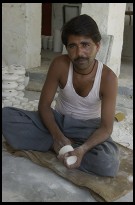 Digital photo titled sanding-pots-at-ceramic-factory-behind-sakshi-sanganer