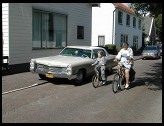 Digital photo titled classic-cadillac-and-bikers