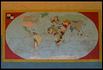 Digital photo titled world-map-painted-on-side-of-schoolhouse