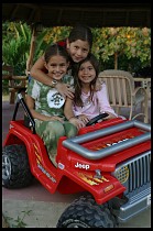 Digital photo titled girls-in-mini-jeep-1