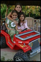 Digital photo titled girls-in-mini-jeep-2