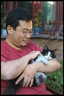 Jin Choi and cat.  Beijing