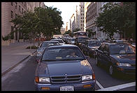 Traffic Jam.  Washington, D.C.  In 1995, Bill Clinton closed Pennsylvania Avenue to traffic by commoners.  Hence residents of Washington, D.C. are forced to fight their way through traffic to get around the White House.