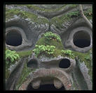 Parco dei Mostri (park of monsters), below the town of Bomarzo, Italy (1.5 hours north of Rome).  This was the park of the 16th century Villa Orsini and is filled with grotesque sculptures.