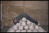 Cannon balls stacked up inside Castel Sant'Angelo (and me)