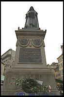 Smack in the center of the Campo de Fiori (Rome) is a statue of Giordano Bruno, philosopher. Bruno held that God was present in nature and that the universe was infinite. The Catholic Church burned him at the stake in 1600, right where his statue is today.