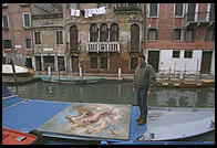 Everything goes in a boat in Venice, including a lot of big oil paintings.