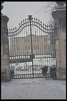 A villa's gates in a light snowfall in Vicenza, Italy.
