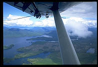 Clear cut Indian-owned mountainsides on the flight to Misty Fjords National Monument.  Southeast Alaska.