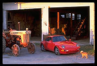 Porsche and tractor.  Amish country.  Pennsylvania.