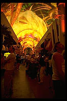 Downtown Las Vegas (Fremont Street) by night, with light show projected onto the canopy over the street.