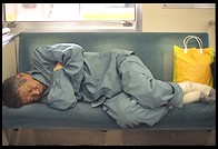 Sleeping on the JR train. Central Tokyo