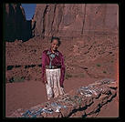Navajo girl selling jewelry.  Monument Valley.