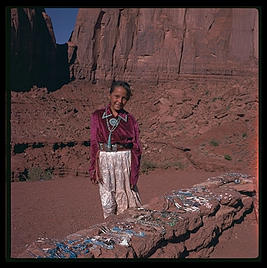 Navajo girl selling jewelry.  Monument Valley.