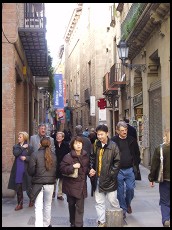 Digital photo titled old-city-tourists-in-narrow-street