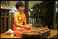 Digital photo titled girl-playing-traditional-music